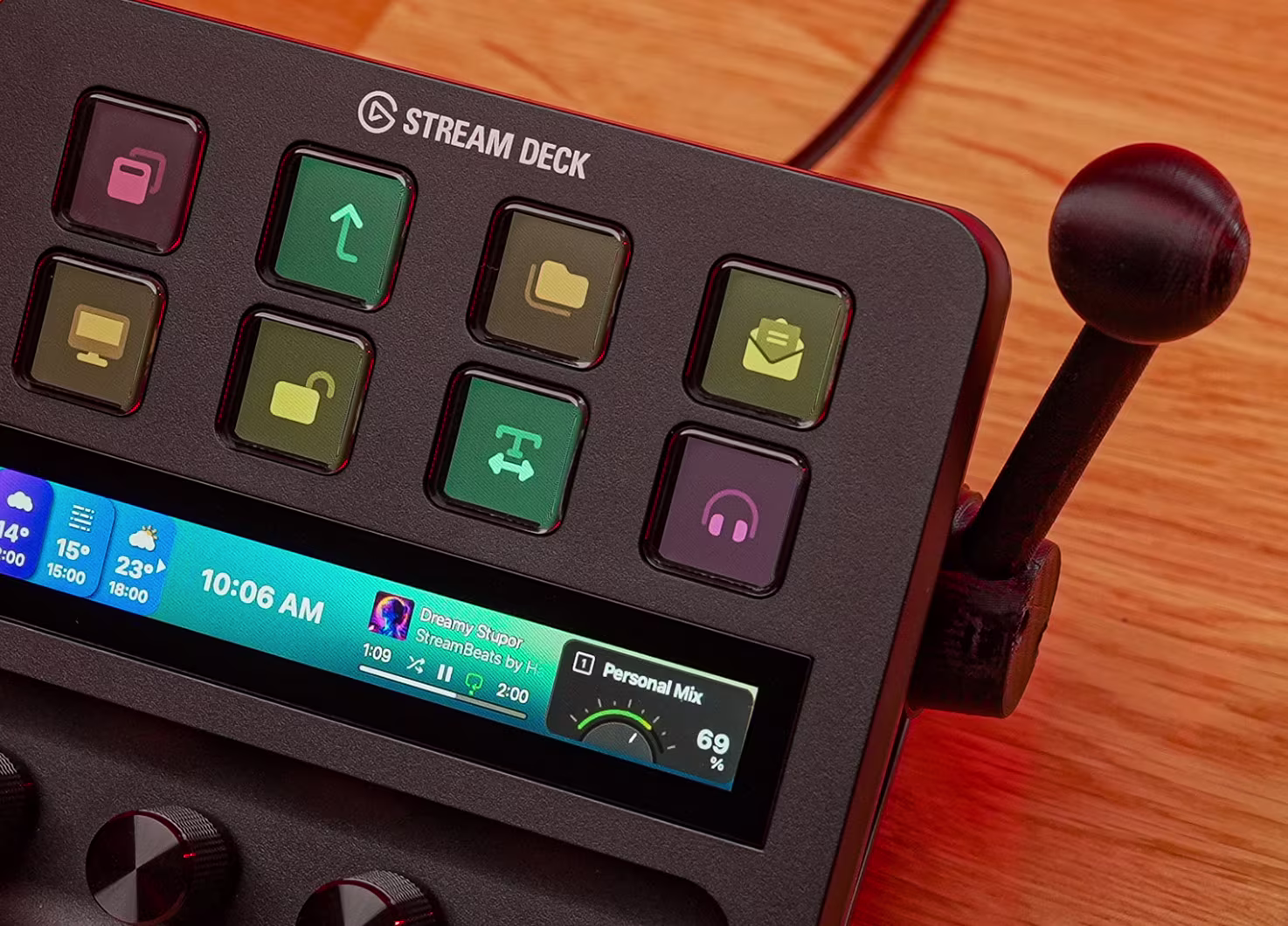 Image of a Stream Deck Plus with a slot machine-like pull lever on the side.